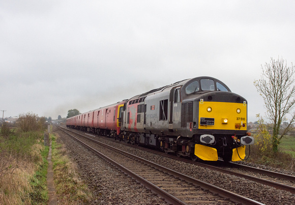 37510 (325013/325006) 5Q76 0015 Mossend - Newport Docks at Ashchurch on Thursday 7 November 2024